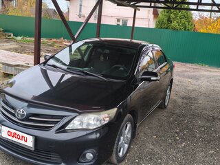 2011 Toyota Corolla X (E140, E150) Рестайлинг, чёрный, 1300000 рублей, вид 1
