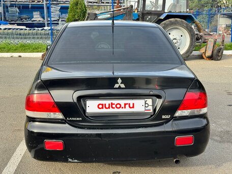 2005 Mitsubishi Lancer IX Рестайлинг, чёрный, 189000 рублей, вид 4