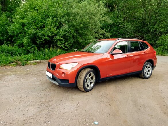 2013 BMW X1 20i I (E84) Рестайлинг, оранжевый, 1600000 рублей