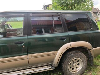 2001 Nissan Patrol V (Y61), зелёный, 850000 рублей, вид 4