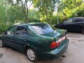 1997 Nissan Almera I (N15), зелёный - вид 4