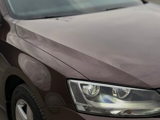 2015 Volkswagen Jetta VI Рестайлинг, коричневый, 1450000 рублей, вид 4
