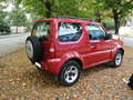 2011 Suzuki Jimny III Рестайлинг 1, красный - вид 7