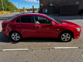 2007 Mitsubishi Lancer X, красный, 530000 рублей, вид 3