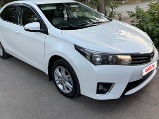2014 Toyota Corolla XI (E160, E170, E180), белый, 1290000 рублей, вид 2