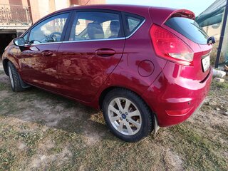 2009 Ford Fiesta Mk6, красный, 560000 рублей, вид 4