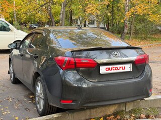 2014 Toyota Corolla XI (E160, E170, E180), чёрный, 1300000 рублей, вид 3