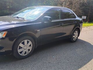 2010 Mitsubishi Lancer X, чёрный, 600000 рублей, вид 3