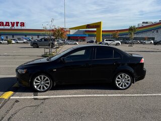 2013 Mitsubishi Lancer X Рестайлинг, чёрный, 830000 рублей, вид 4