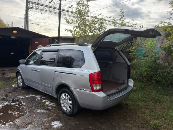2009 Kia Carnival Grand II, серый, 900000 рублей - вид 4