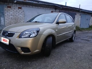 2011 Kia Rio II Рестайлинг, бежевый, 560000 рублей, вид 1