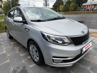 2015 Kia Rio 6-speed III, серый, 1020000 рублей, вид 1