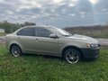 2008 Mitsubishi Lancer X, бежевый, 420000 рублей - вид 4