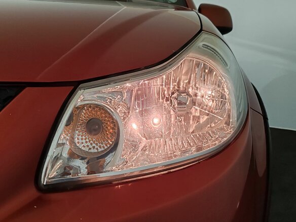 2010 Suzuki SX4 I (Classic) Рестайлинг, оранжевый, 750000 рублей - вид 22
