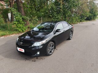 2011 Toyota Corolla X (E140, E150) Рестайлинг, чёрный, 1550000 рублей, вид 1