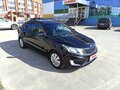 2014 Kia Rio 6-speed III, чёрный, 880000 рублей - вид 1