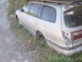 1996 Toyota Caldina I Рестайлинг, серый - вид 3