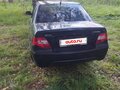 2010 Daewoo Nexia I Рестайлинг, чёрный - вид 1