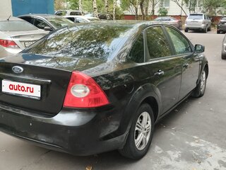 2010 Ford Focus II Рестайлинг, чёрный, 529000 рублей, вид 4