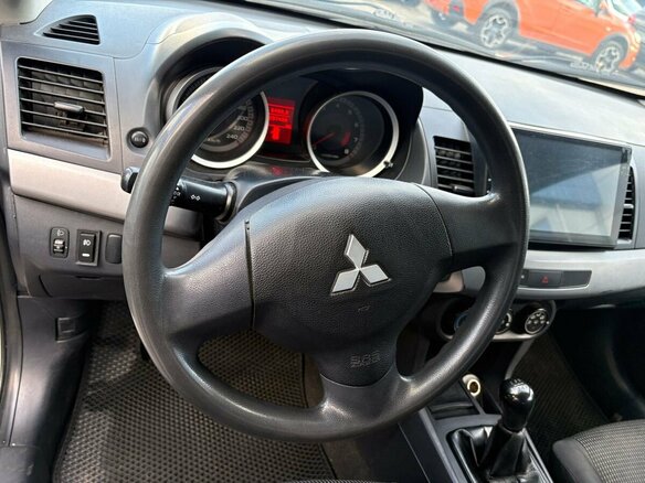 2007 Mitsubishi Lancer X, бежевый, 472000 рублей - вид 11