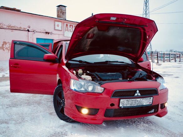 2007 Mitsubishi Lancer X, красный - вид 13