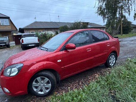 2011 Kia Rio II Рестайлинг, красный, 490000 рублей, вид 4