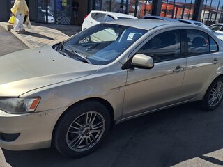2007 Mitsubishi Lancer X, бежевый, 600000 рублей, вид 1