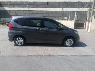 2018 Honda Freed II, серый, 1690000 рублей, вид 4