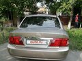 2004 Kia Magentis I Рестайлинг, бежевый - вид 4