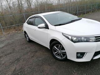 2014 Toyota Corolla XI (E160, E170, E180), белый, 1250000 рублей, вид 4