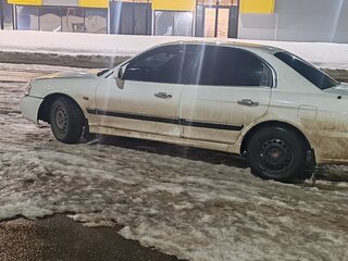 2004 Kia Magentis I Рестайлинг, белый, 335000 рублей, вид 4