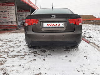 2010 Kia Cerato 5-speed II, золотистый, 750000 рублей, вид 4