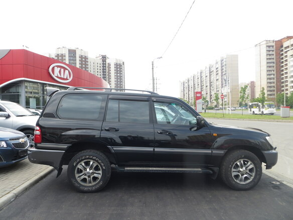 2004 Toyota Land Cruiser 100 Series Рестайлинг 1, чёрный - вид 2
