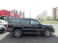 2004 Toyota Land Cruiser 100 Series Рестайлинг 1, чёрный - вид 2