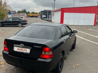 2001 Toyota Corolla IX (E120, E130), чёрный, 650000 рублей, вид 5