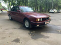 1990 BMW 5 серии 525i III (E34), красный - вид 11
