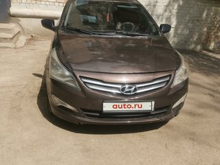2016 Hyundai Solaris I Рестайлинг, коричневый, 650000 рублей, вид 2
