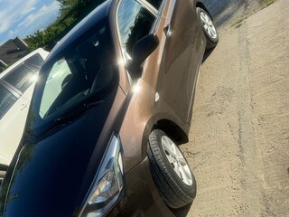 2016 Hyundai Solaris I Рестайлинг, коричневый, 890000 рублей, вид 2