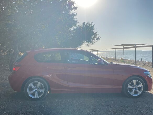 2012 BMW 1 серии 116i II (F20/F21), красный, 1340000 рублей - вид 7