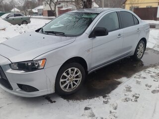 2011 Mitsubishi Lancer X Рестайлинг, серебристый, 770000 рублей, вид 1