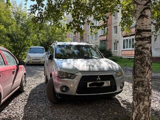 2011 Mitsubishi Outlander II Рестайлинг, серебристый, 1100000 рублей, вид 1