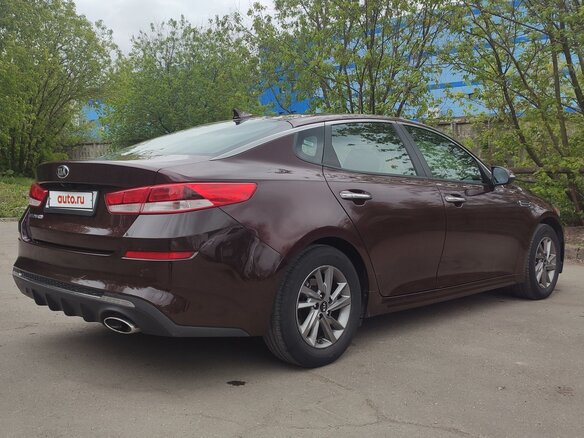 2019 Kia Optima IV Рестайлинг, пурпурный, 1920000 рублей - вид 3