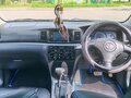 2003 Toyota Corolla Runx IX (E120, E130), серый, 530000 рублей - вид 10