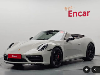 2023 Porsche 911 Carrera 4 GTS VIII (992), серый, 17000000 рублей, вид 1