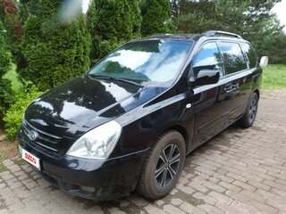 2009 Kia Carnival Grand II, чёрный, 850000 рублей, вид 1