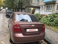 2011 Chevrolet Aveo I Рестайлинг, коричневый, 450000 рублей - вид 2