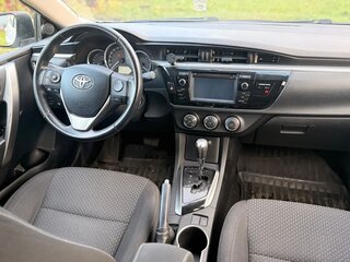 2014 Toyota Corolla XI (E160, E170, E180), белый, 1299999 рублей, вид 5