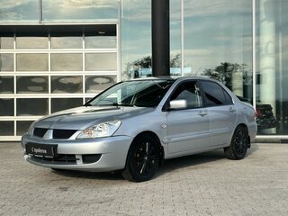 2006 Mitsubishi Lancer IX Рестайлинг, серебристый, 230000 рублей, вид 1