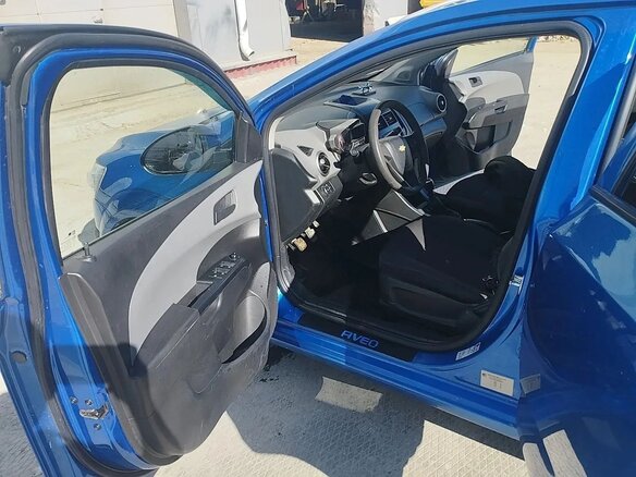 2014 Chevrolet Aveo II, синий, 550000 рублей - вид 4