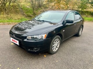 2010 Mitsubishi Lancer X, чёрный, 589500 рублей, вид 1